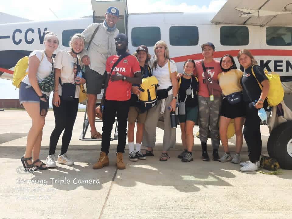 Francis with a group of tourists have just landed in Kigali Airport ready to head to Bwindi in Uganda for Gorilla trekking.